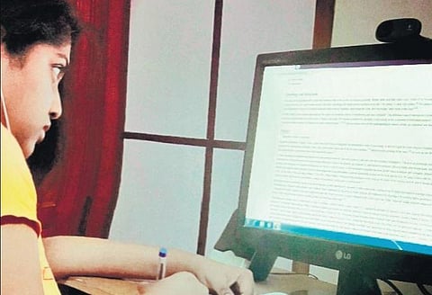 A student pursuing MBBS in China attends an online class | Express