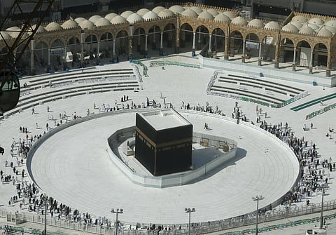 Muslims circumambulate the Kaaba, the cubic building at the Grand Mosque, in the Muslim holy city of Mecca, Saudi Arabia, Saturday, March 7, 2020. (Photo | AP)
