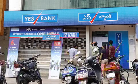 Customers at Yes Bank Dwarakanagar branch in Visakhapatnam on Saturday. (Photo | EPS)