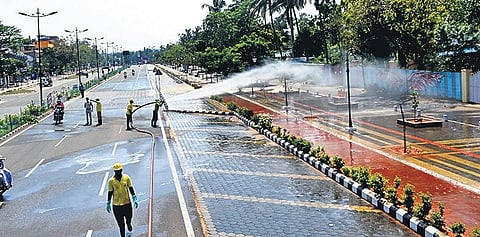 Fire Service personnel disinfecting streets at Bapuji Nagar in Bhubaneswar on Tuesday | Express
