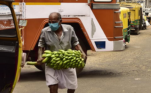Banana vendors seen wearing mask amid coronavirus lockdown. (Photo | EPS)