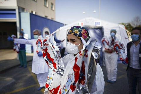 Medical staffers hold Easter eggs received as gifts, at Rome's San Filippo Neri Hospital's Covid department, Thursday, April 9, 2020. (Photo | AP)