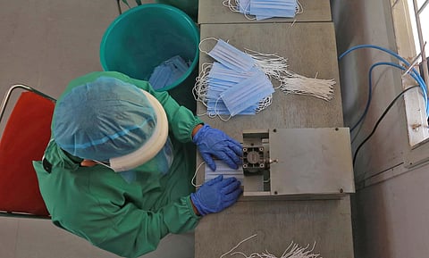 CRPF personnal stich facemask at a camp in RK Puram. (Photo | Shekhar Yadav, EPS)