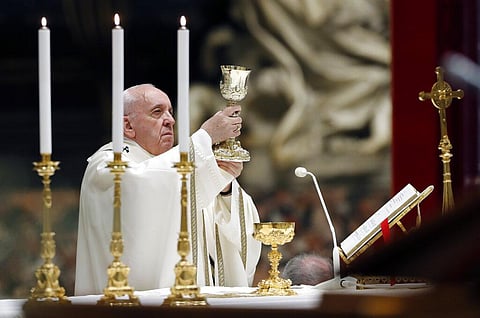 Pope Francis presides over a solemn Easter vigil ceremony in St. Peter's Basilica empty of the faithful following Italy’s ban on gatherings to contain coronavirus contagion. (Photo | AP)