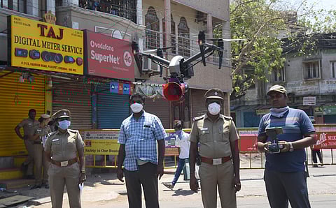 Drones fitted with public addres systems deployed at Pudupettai on Saturday advising residents not to venture out from their houses. (Photo | Martin Louis/EPS)