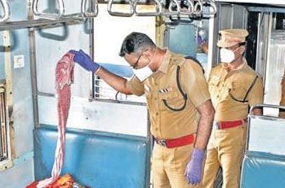 SP Jeyakumar and police personnel searching on a train | Express