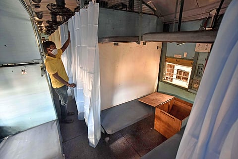 Workers giving final touches to train bogies that are being converted into isolation wards at the carriage workshop in Perambur, Chennai (Photo | P Jawahar, EPS)