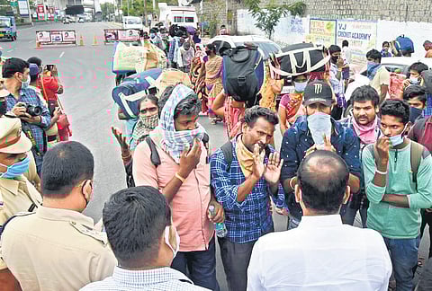 Uppal MLA B Subhash Reddy speaks to migrant labourers who set out to walk from Marredpally in Hyderabad to Srikakulam in Andhra Pradesh after receiving news of the extension of the nationwide lockdown | R V K Rao