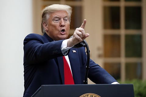 President Donald Trump speaks about the coronavirus in the Rose Garden of the White House, Tuesday, April 14, 2020, in Washington. (Photo | AP)