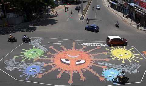 A huge graffiti is seen on a road near Teynampet signal, Anna Salai during a nationwide lockdown in the wake of coronavirus pandemic. (Photo | Martin Louis/EPS)
