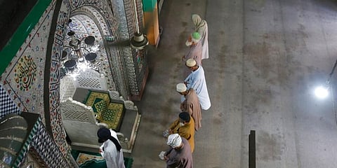 People attend Friday prayers at a mosque during a nation-wide lockdown as a preventive measure against coronavirus in Lahore, Pakistan. (Photo | AP)