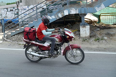 A food delivery man working during the lockdown. (File photo| Nagaraja Gadekal, EPS)
