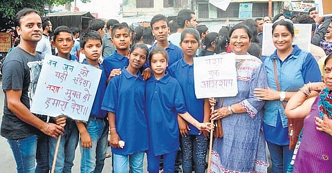 Tanuja Joshi with others during a de-addiction campaign. (Photo | EPS)