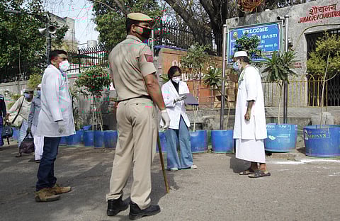 Coronavirus suspect people being taken to hospital to check from Nizamuddin Areaon Tuesday. (Photo | Anil Shakya/EPS)