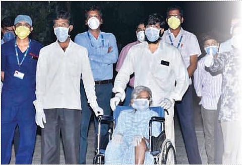 An 85-year-old woman who recovered from Covid-19 being discharged in Anantapur on Tuesday. (Photo | EPS)