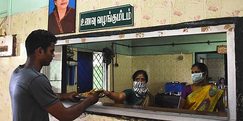 A customer at an Amma Canteen in Egmore during the lockdown (Photo| Ashwin Prasath, EPS)
