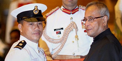 Then President Pranab Mukherjee presents Padma Shri to boxer Ngangom Dingko Singh. (File Photo | PTI)
