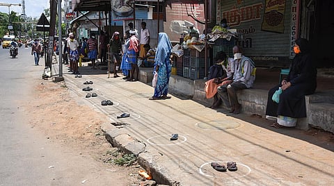 People wait outside ration shop in Tiruchy. (Photo| EPS)