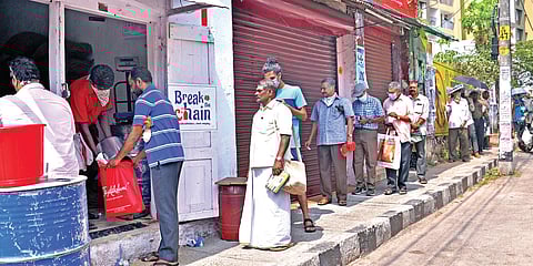 People at a ration shop in  Thiruvananthapuram.  (EPS | Vincent Pulickal)