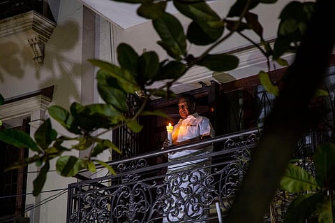 Puducherry Chief Minister V.Narayansamy lit a lamp at his balcony on Sunday to show his solidarity to end the 'darkness' of coronavirus' as requested by PM. (File Photo | G Pattabi Raman/EPS)