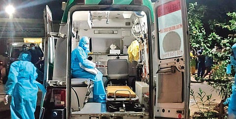 Medical staff shift an Army personnel from Jangaon, who has tested positive for Covid-19, to Gandhi Hospital