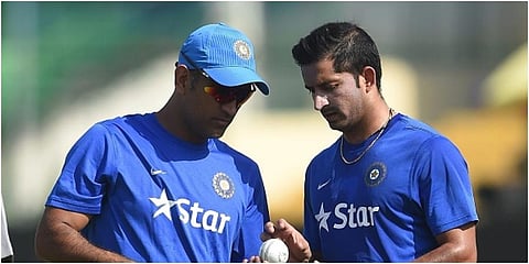 MS Dhoni with Mohit Sharma during a training session. (File Photo | AFP)