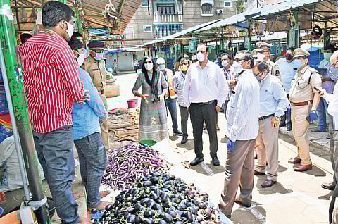 The Inter Ministerial Central Team interacts with vegetable vendors at the Rythu Bazaar in Mehdipatnam on Sunday