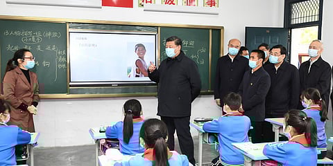Primary, secondary school students return to class in parts of China