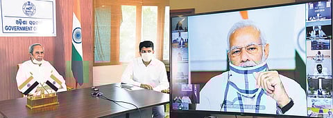 Chief Minister Naveen Patnaik discussing with Prime Minister Narendra Modi on Covid-19 situation through video conferencing on Monday