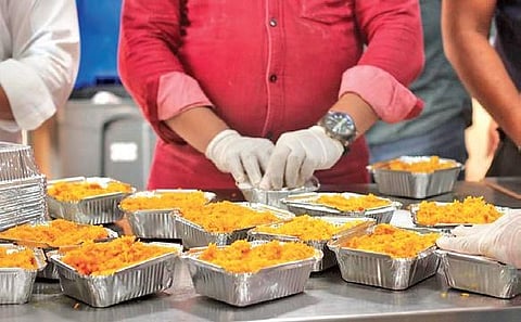 Foodlink distributes freshly-prepared khichdi daily among the needy