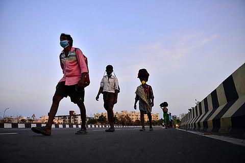 Migrant workers march to reach home.(Photo| EPS/ Debadatta Mallick)