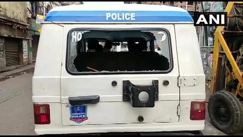 A police vehicle damaged in the attack at Howrah. (Photo | Twitter/ANI)