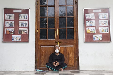 Puducherry Health Minister Malladi Krishna Rao on a dharna inside the legislative assembly on Wednesday demanding the entry of 13 residents of Yanam (Express photo by Pattabi Raman)