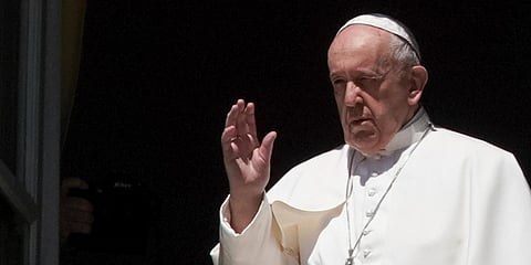 Pope Francis delivers his blessing from the window of his studio overlooking an empty St. Peter's Square, due to anti-coronavirus lockdown measures, at the Vatican. (File photo| AP)