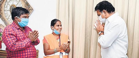 A Alivelu, a GHMC sanitation worker, and her husband Srisailam with IT Minister KT Rama Rao at Pragathi Bhavan on Tuesday