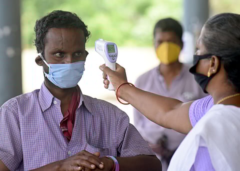 Distribution of free masks and health checkup conducted for needy amid the nationwide lockdown to curb the spread of coronavirus at Tambaram by DPH. (Photo | Martin Louis/EPS)