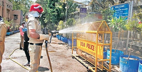 Delhi Fire Service staff sanitize the Nizamuddin area on Friday | Anil Shakya