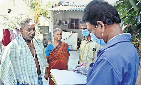 A Domestic Breeding Checker checking for breeding places or symptoms of the SARS-CoV-2 at Pallikaranai in Chennai on Thursday | Ashwin prasath