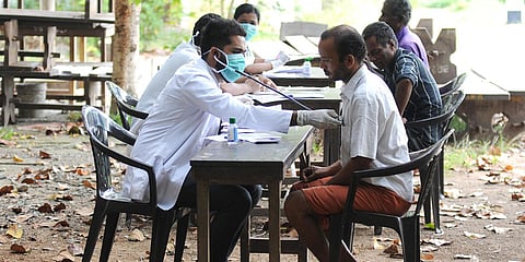 Doctors conducting checkups at Govt Girls Higher Secondary School as part of a sanitation drive against COVID-19 in Kochi. (Photo| A Sanesh, EPS)
