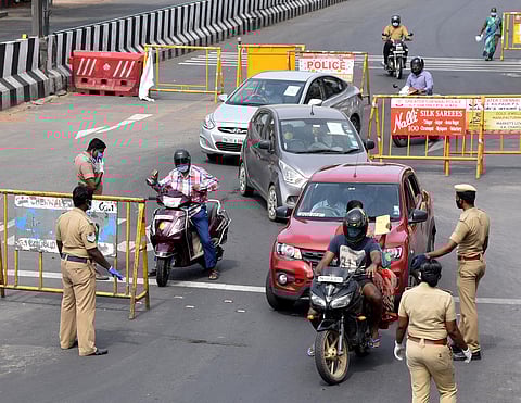 Vehicle movement during the complete lockdown near Kilpauk Poonamallee High road in Chennai on Wednesday. (Photo | R Sathish Babu/EPS)