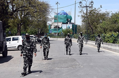 CRPF pesonnel petrolling at the area near Nizamuddin mosque after people who attended the religious congregation at Tabligh-e-Jamaat's Markaz tested postive for COVID-19 in New Delhi on Friday. (Photo | Parveen Negi/EPS)