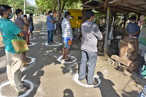 People Buying meat at a Meat stall in Ramanathapuram in Coimbatore city on Sunday. (Photo | U Rakesh Kumar/EPS)