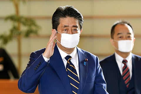 Abe said that he will declare a state of emergency for Tokyo and six other prefectures as early as Tuesday to bolster measures to fight the coronavirus outbreak, but that there will be no hard lockdowns. (Photo | AP)