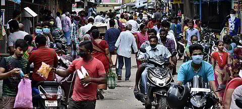 Local residents shopping for vegetables and groceries at Sharma Nagar Vyasarapadi after four days of complete lockdown to prevent novel coronavirus on Thursday in Chennai. (Photo | P Jawahar/EPS)