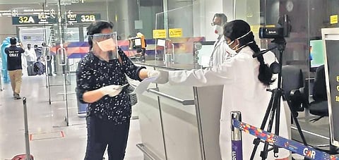 An Indian national arrives from Kuwait at the RGIA in Hyderabad on Saturday