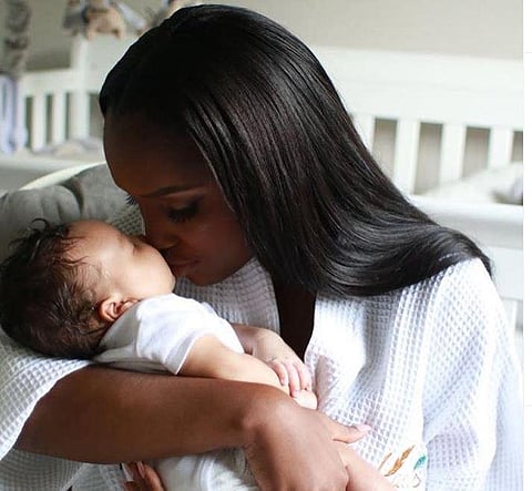 Jevon King with her newborn child.