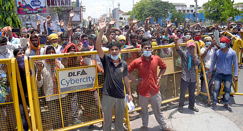 Migrant workers of an IT park at Ramapuram alleged that they were not paid salaries post March and urged authorities to send them back home. (Photo | Martin Louis, EPS)