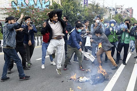 Nepalese demonstrators shout slogans and burn an effigies during a protest against India's newly inaugurated link road to the Chinese border. (Photo| AFP)