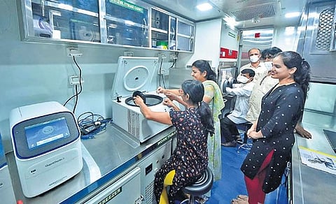 People take a look at PARAKH, a mobile microbial containment lab developed by Mysuru’s DRDO Defence Food Research Lab. (Photo | Udayshankar S, EPS)