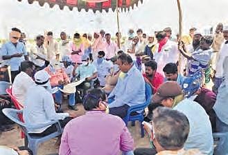 AP and Telangana officials hold discussions to settle row over sand mining on the banks Tungabhadra near Gundrevula village in Kurnool district on Wednesday